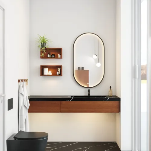 Moderne og stilfuld badeværelse inspiration med oval spejl med sort ramme og lysstyring, farvet toilet, vaskeskab, underskabe og skabe i rødbrun eg, Silestone vask og matchende gulv