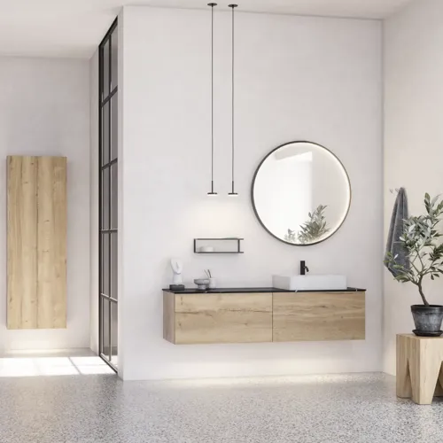 Stort urban badeværelse inspiration med natur eg møbler, stenbordplade med firkantet vask, rundt spejl med sort kant, naturfarver og terracottagulv giver et industrielt og moderne look