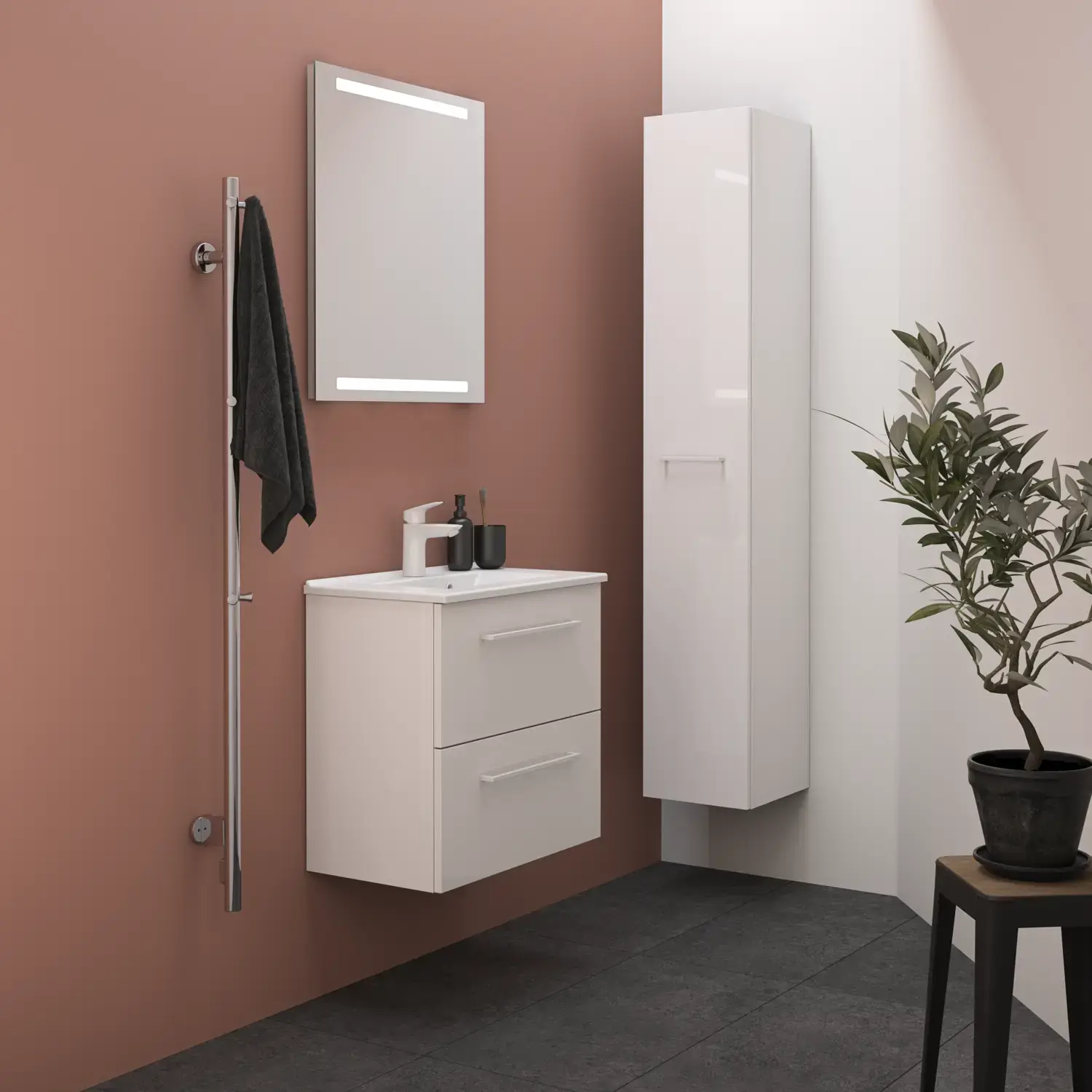 Lille badeværelse inspiration med hvide badeværelsesmøbler med hvide greb, elegant håndvask, samt smukt spejl med integreret lys, store grå fliser samt rosafarvet væg giver et moderne udtryk.