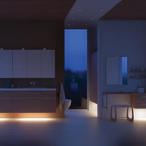 Moderne badeværelse i nordisk stil med lyst træ, elegant belysning, spejlskabsvæg og stilfuld indretning, der skaber en varm og indbydende atmosfære.