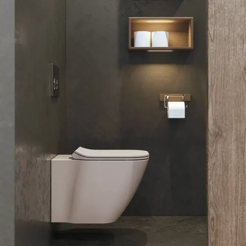 Stilrent og rummeligt badeværelse inspiration med stort rundt spejl med sort ramme, mørk stenvask, farvet toilet, overskab og åben reol i et sofistikeret og dæmpet design.